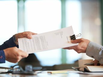 iamge of contracts being swapped for replacement birth certificate in ireland